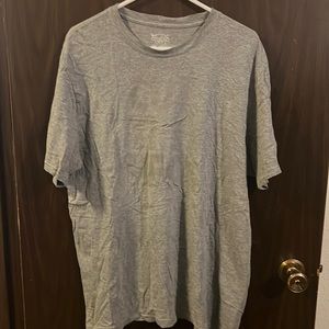 Men’s Nike grey shirt sleeve shirt. Lightly says “cut the check”